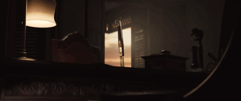 Dark Room With Lamp And Telephone GIF