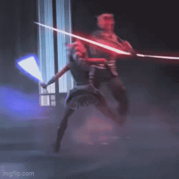 Darth Maul And Ahsoka Tano Are Fighting With Lightsabers In A Dark Room . GIF