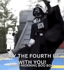 Darth Vader Is Dancing In Front Of Stormtroopers And Says `` May The Fourth Be With You ! '' GIF