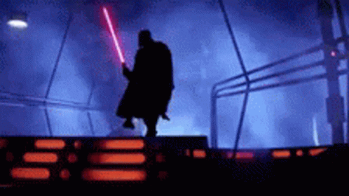 Darth Vader Silhouette Holding Lightsaber