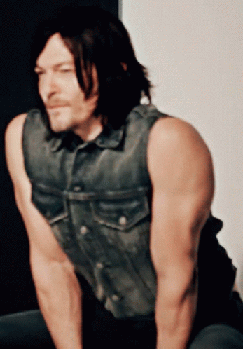 Daryl Dixon Flexing His Arms GIF