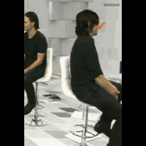 Daryl Dixon Playing With Chair GIF