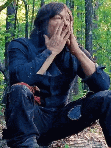 Daryl Dixon Putting Hands On Face GIF