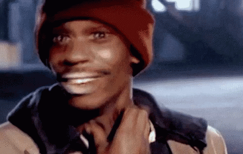 Dave Chappelle Smiling Neck Scratch GIF