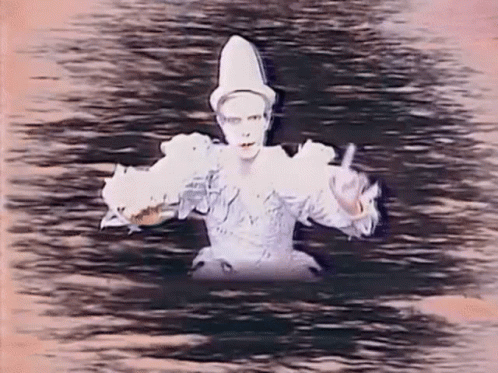 David Bowie Dipping Himself On Water GIF