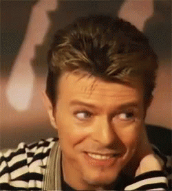 David Bowie Laughing Hands On Chin GIF