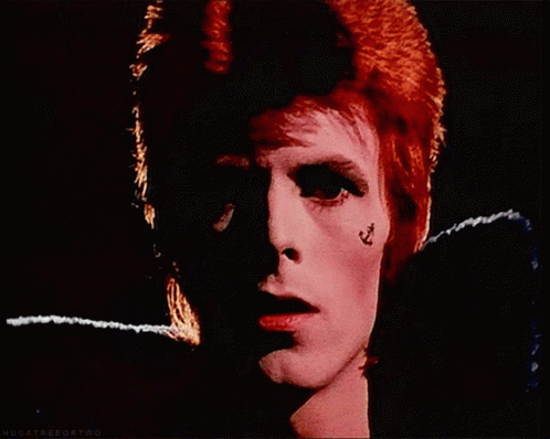David Bowie Red Hair Tattoo On Cheek GIF