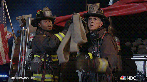 David Eigenberg Holding Fire Hose GIF