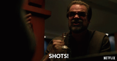 David Harbour Fist Pump Shots GIF