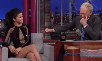 David Letterman And Selena Gomez Fist Bump With Laugh GIF