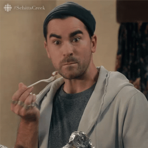 David Rose Nibbling Schitts Creek GIF