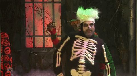 David S Pumpkins With Skeleton And Zombie GIF