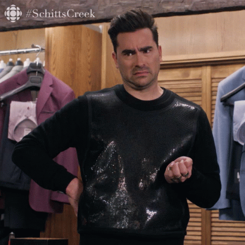 David Rose Suspicious Reaction Schitts Creek GIF