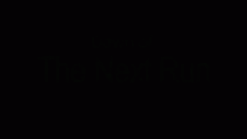 Dawn Of The Next Run Is Written In White On A Black Background GIF