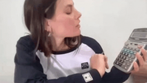 Dayane Mello Typing In Calculator GIF