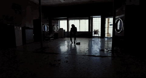 Dead Woman With Spider GIF