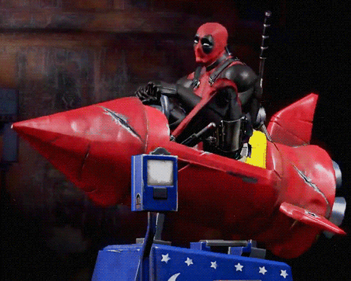 Deadpool Dance Riding Rocket Ship Toy Machine GIF