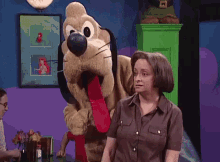 Debbie Downer With Pluto Mascot GIF