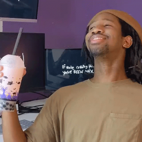 Man Holding His Milktea Deep Breathing GIF