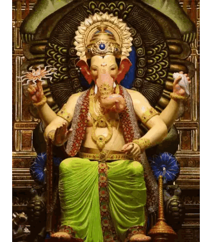 Deity Statue Sitting on Throne with Crown
