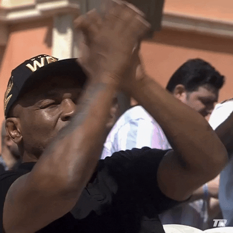 Delightful Mike Tyson Applauding GIF