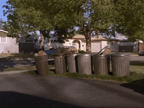 Delorean Crashing Into Trash Cans GIF