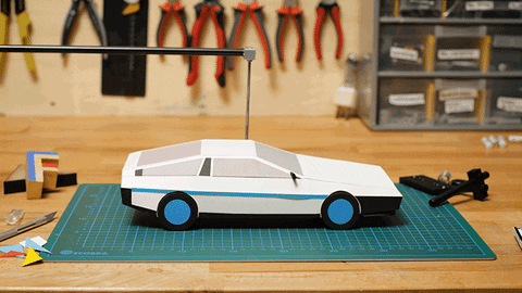 Delorean Toy Car Tied To String GIF