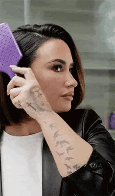 Demi Lovato Combing Hair GIF