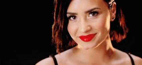 Demi Lovato Winking Smile GIF