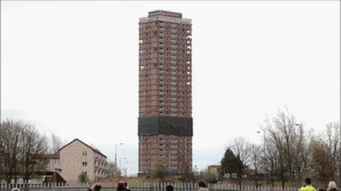 Demolition Team Demolishing Tall Building GIF