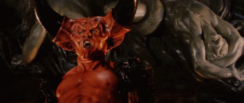Demon With Horns and Snake Behind