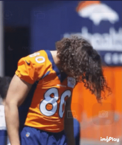 Denver Broncos Greg Dulcich Hair Flip GIF