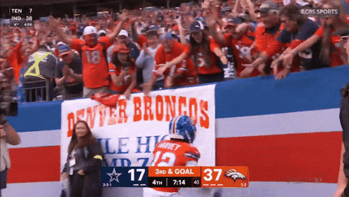 Denver Broncos Player In Front Of Banner GIF