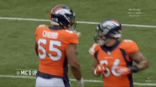 Denver Broncos Players 55 and 56 Hugging