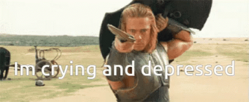 Depressed Man Crying With Sword On Back GIF