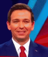 Desantis Serious Glance GIF