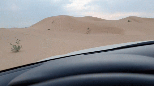 Driving On The Sand Of Desert GIF