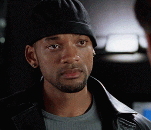 Detective Del Spooner Sipping Coffee Investigating About Irobot GIF