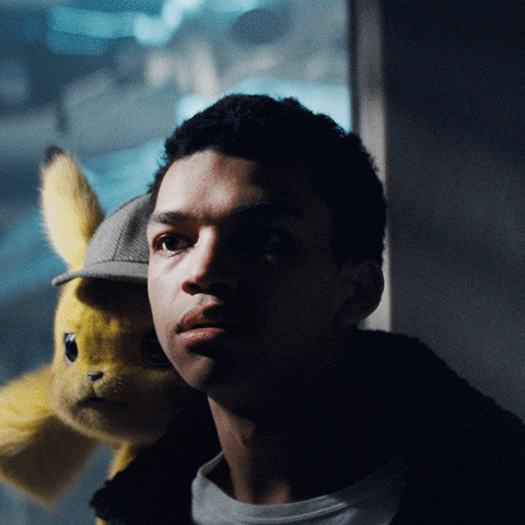 Detective Pikachu On Harry Goodman Shoulder GIF