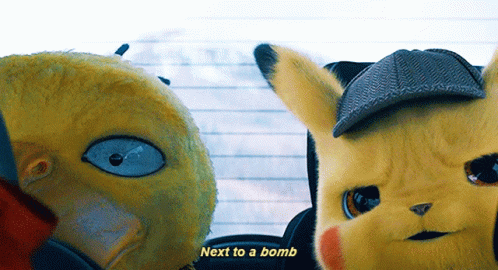 Detective Pikachu Sitting Next To Psyduck GIF