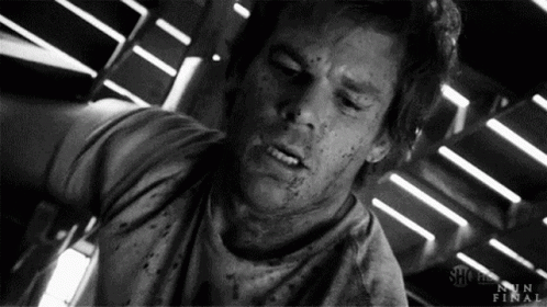 Dexter Morgan Black And White Hitting A Victim GIF