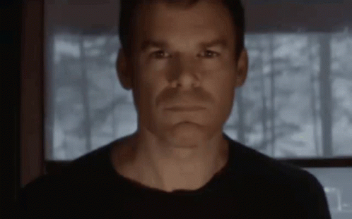 Dexter Morgan Intense Stare Eyebrow Twitch GIF