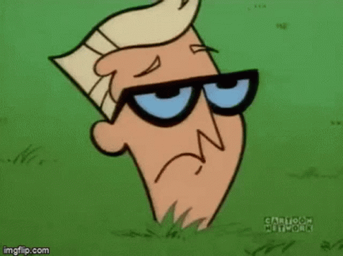 Dexter From Dexter's Laboratory Standing In Grass GIF