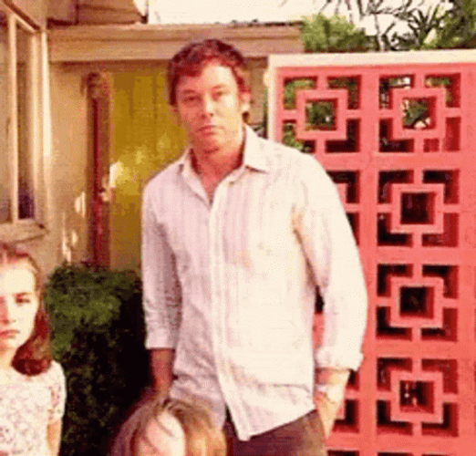 Dexter Morgan Shoulder Shrug GIF