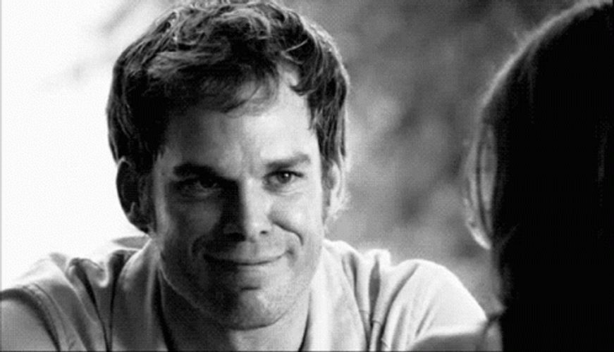 Dexter Morgan Timid Smile GIF