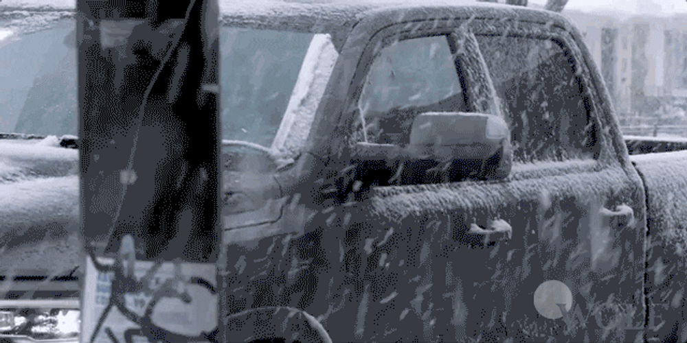 Dick Wolf Walking In Snow Storm GIF