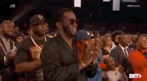 Diddy Applauding On His Seat GIF
