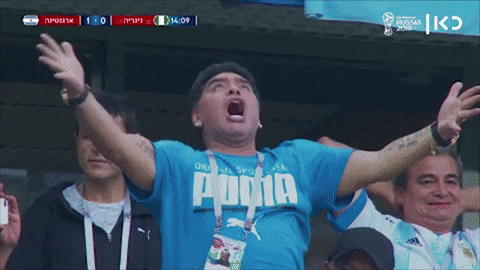 Diego Maradona Looking Up Crossed Arms GIF