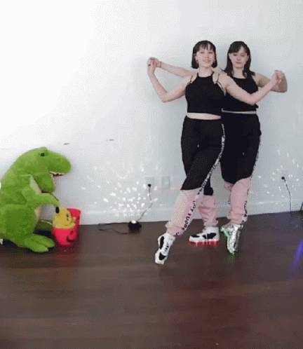 Dinomite Twins Executing Irish Jig GIF