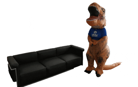 Dinosaur Costume Lying On The Couch GIF